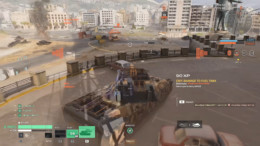 In battle HUD showing critical fuel tank damage during an urban map firefight
