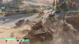 Tanks racing through a desert village toward base A with an immobilized enemy target